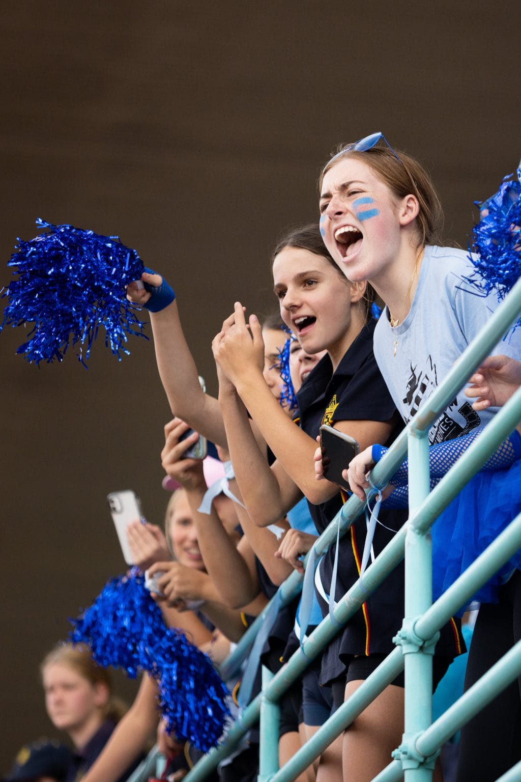 Students cheering on ther house as part of the The House System at St Catherine's